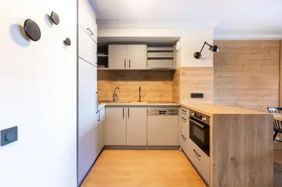 Cuisine ou kitchenette dans l'établissement Résidence Les Arcs 1950 Le Village - maeva Home - 4 Pièces 10 Personnes Exclusive - Le Prince des Cîmes MAE-8360