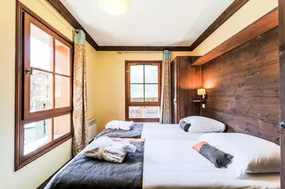 Un ou plusieurs lits dans un hébergement de l'établissement Résidence Les Arcs 1950 Le Village - maeva Home - Appartement 3 Pièces 6 Personnes - Sélection MAE-2357