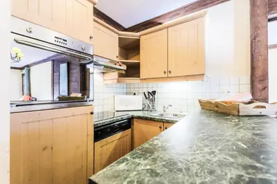 Cuisine ou kitchenette dans l'établissement Résidence Les Arcs 1950 Le Village - maeva Home - Appartement 3 Pièces 6 Personnes - Sélection MAE-5480