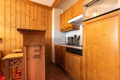 Cuisine ou kitchenette dans l'établissement Résidence Les Arcs 1950 Le Village - maeva Home - Appartement 3 Pièces 6 Personnes - Sélection MAE-7310
