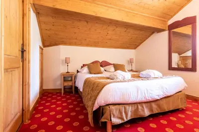 Un ou plusieurs lits dans un hébergement de l'établissement Résidence Les Arcs 1950 Le Village - maeva Home - Appartement 3 Pièces 6 Personnes - Prestige MAE-6614