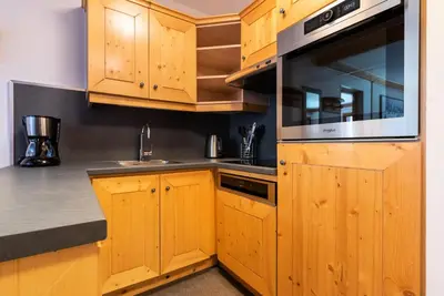 Cuisine ou kitchenette dans l'établissement Résidence Les Arcs 1950 Le Village - maeva Home - Appartement 3 Pièces 6 Personnes - Prestige MAE-6704