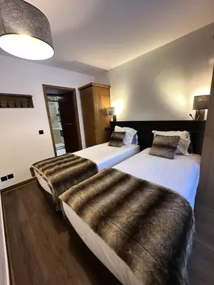 Un ou plusieurs lits dans un hébergement de l'établissement Résidence Les Arcs 1950 Le Village - maeva Home - Appartement 3 pièces 6 personnes - Prestige MAE-5494