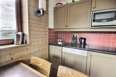 Cuisine ou kitchenette dans l'établissement Résidences quartier Charmettoger - maeva Home - Studio 4 personnes - Sélection MAE-7494