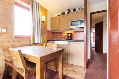 Cuisine ou kitchenette dans l'établissement Résidences quartier Charmettoger - maeva Home - Studio 4 personnes - Sélection MAE-7494