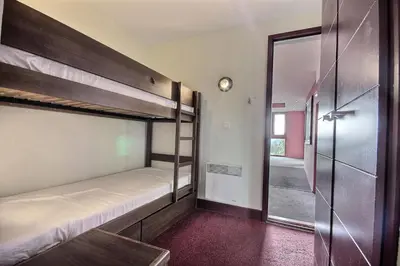 Un ou plusieurs lits dans un hébergement de l'établissement Résidences quartier Charmettoger - maeva Home - Studio 4 personnes - Sélection MAE-7494