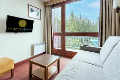 Télévision ou salle de divertissement dans l'établissement Résidences quartier Charmettoger - maeva Home - Studio 4 personnes - Sélection MAE-7494