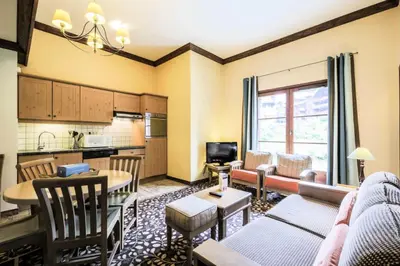 Coin salon dans l'établissement Résidence Les Arcs 1950 Le Village - maeva Home - Appartement 2 pièces 6 personnes - Sélection MAE-6904