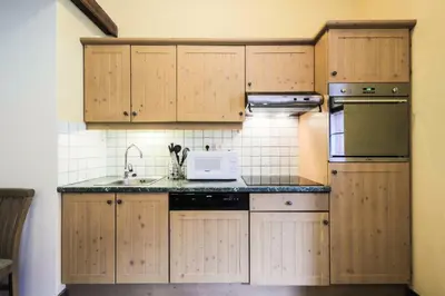 Cuisine ou kitchenette dans l'établissement Résidence Les Arcs 1950 Le Village - maeva Home - Appartement 2 pièces 6 personnes - Sélection MAE-6904
