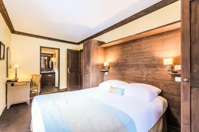Un ou plusieurs lits dans un hébergement de l'établissement Résidence Les Arcs 1950 Le Village - maeva Home - 3 pièces 6 personnes Sélection - Manoir de Savoie MAE-8121
