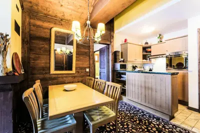 Cuisine ou kitchenette dans l'établissement Résidence Les Arcs 1950 Le Village - maeva Home - Appartement 3 pièces 4 personnes - Sélection MAE-3984