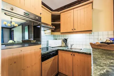 Cuisine ou kitchenette dans l'établissement Résidence Les Arcs 1950 Le Village - maeva Home - Appartement 3 pièces 6 personnes Sélection - Vue directe sur le Mont Blanc MAE-4037