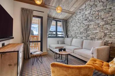 Coin salon dans l'établissement Chalet Hôtel Turquoise