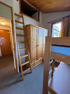 Un ou plusieurs lits superposés dans un hébergement de l'établissement Chalet Hôtel Turquoise