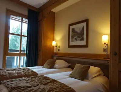 Un ou plusieurs lits dans un hébergement de l'établissement 5* Flat - 6 people - Arc 1950 - Sun - View - SPA