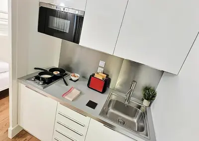 Cuisine ou kitchenette dans l'établissement Résidence Home Club - Très beau studio cabine exposé plein Sud et refait à neuf MAE-1771