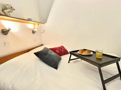 Un ou plusieurs lits dans un hébergement de l'établissement Résidence Les Jardins De Val - Appartement 2 pièces pour 4 personnes à Val d'Isère à 350 mètres du centre du village et 450m des pistes MAE-1814