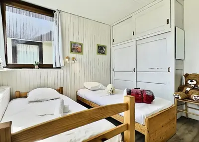 Un ou plusieurs lits dans un hébergement de l'établissement Résidence Les Roches Rouges A Ou B - Appartement agréable de 4 pièces pour 8 personnes à Tignes proche des commerces et des pistes dans le quartier du Lavachet MAE-1994