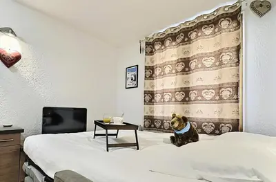 Un ou plusieurs lits dans un hébergement de l'établissement Résidence Les Jardins De Val - Agréable studio cabine complètement rénové pour 4 personnes situé à Val d'isère à 350m du centre du village et 450m des pistes MAE-0164