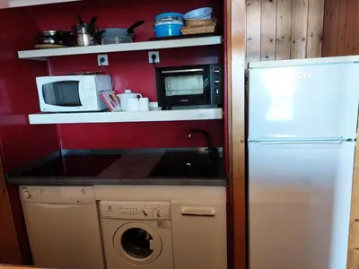 Cuisine ou kitchenette dans l'établissement Résidence Tournavelles - Appartement 4 pièces pour 8 personnes en duplex, au pied des pistes et des commerces, proche de l'ESF et de la garderie dans le MAE-1683