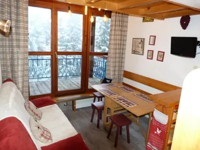 Coin salon dans l'établissement Résidence Archeboc - Appartement 5 personnes à Arc 1800 proche des pistes dans le village de Charmettoger MAE-1746