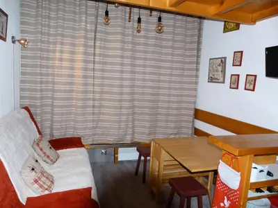 Coin salon dans l'établissement Résidence Archeboc - Appartement 5 personnes à Arc 1800 proche des pistes dans le village de Charmettoger MAE-1746
