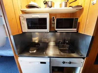 Cuisine ou kitchenette dans l'établissement Résidence Belles Challes - Studio 4 personnes à Arc 1800 skis aux pieds et proche des commerces dans le village du Charvet MAE-1832