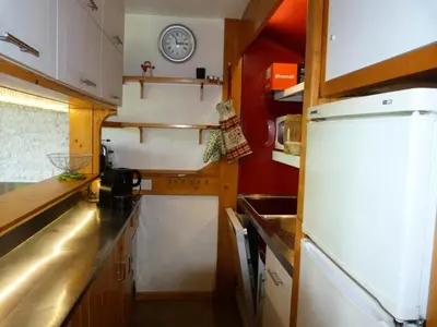 Cuisine ou kitchenette dans l'établissement Résidence Tournavelles - Bel appartement 4 pièces pour 8/10 personnes en duplex, avec vue sur les pistes, skis aux pieds et proche des commerces dans le MAE-1864