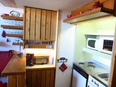Cuisine ou kitchenette dans l'établissement Résidence Archeboc - Appartement de charme en duplex, équipé pour 6 personnes, proche des pistes dans le village de Charmettoger à Arc 1800 MAE-1887
