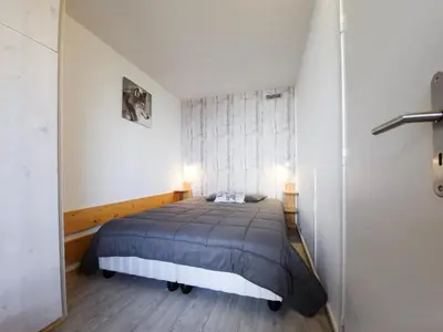 Un ou plusieurs lits dans un hébergement de l'établissement Résidence Nova - Appartement 2 pièces 6 personnes, lumineux avec une vue plongeante sur la vallée, un casier à ski, proche des pistes et des comm MAE-1889
