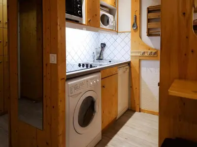 Cuisine ou kitchenette dans l'établissement Résidence Nova - Appartement 2 pièces 6 personnes, lumineux avec une vue plongeante sur la vallée, un casier à ski, proche des pistes et des comm MAE-1889