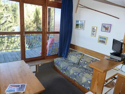 Télévision ou salle de divertissement dans l'établissement Résidence Archeboc - Appartement 5 personnes à Arc 1800 proche des pistes dans le village de Charmettoger MAE-1917