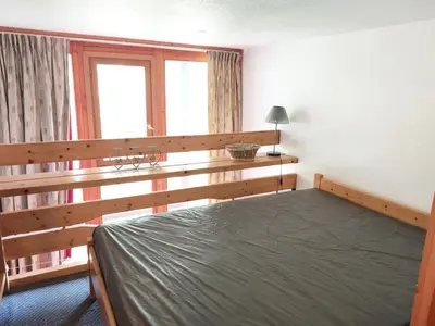 Un ou plusieurs lits dans un hébergement de l'établissement Résidence Mirantin 2 - Duplex pour 4 personnes proche des pistes et des commerces - Résidence calme dans le village de Charmettogerà Arc 1800 MAE-1980
