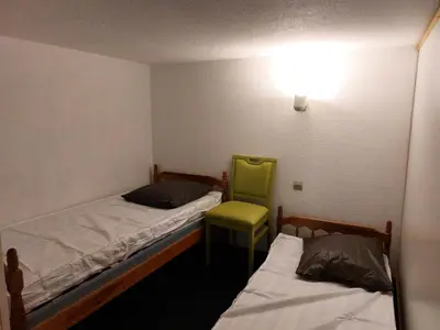 Un ou plusieurs lits dans un hébergement de l'établissement Résidence Archeboc - Appartement en duplex pour 6 personnes à Arc 1800 proche des pistes dans le village de Charmettoger MAE-2023