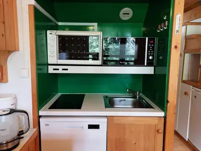 Cuisine ou kitchenette dans l'établissement Résidence Archeboc - Appartement en duplex pour 6 personnes à Arc 1800 proche des pistes dans le village de Charmettoger MAE-2023