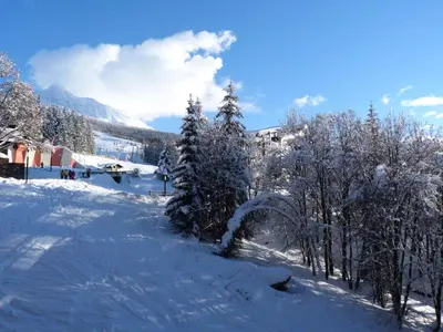 L'établissement Résidence Nova - Appartement 2 pièces 6 personnes proche des pistes, des commerces, de la garderie et de l'ESF au centre de la station d’Arc 1800 MAE-2029 en hiver