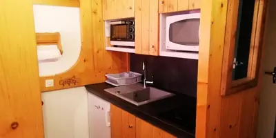 Cuisine ou kitchenette dans l'établissement Résidence Nova - Appartement 2 pièces 6 personnes proche des pistes, des commerces, de la garderie et de l'ESF au centre de la station d’Arc 1800 MAE-2029