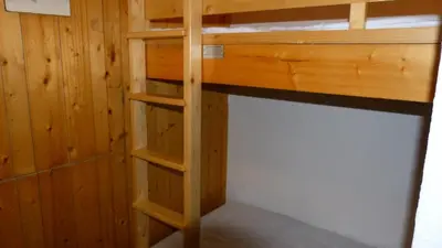 Un ou plusieurs lits superposés dans un hébergement de l'établissement Résidence Nova - Appartement 2 pièces 6 personnes proche des pistes, des commerces, de la garderie et de l'ESF au centre de la station d’Arc 1800 MAE-2029
