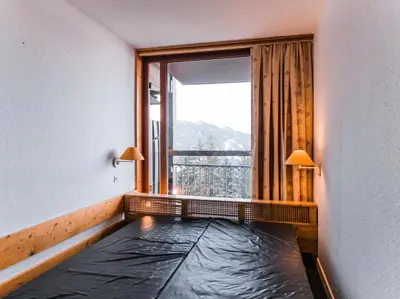 Un ou plusieurs lits dans un hébergement de l'établissement Résidence Nova - Appartement 2 pièces 6 personnes proche des pistes, des commerces, de la garderie et de l'ESF au centre de la station d’Arc 1800 MAE-2042