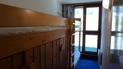 Un ou plusieurs lits dans un hébergement de l'établissement Résidence Tournavelles - Appartement 2 pièces 5 personnes avec vue sur les pistes, skis aux pieds et des commerces, proche de l'ESF et de la garderie dan MAE-2071