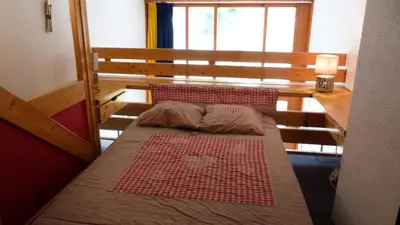 Un ou plusieurs lits dans un hébergement de l'établissement Résidence Aiguille Grive Bat Ii - Appartement 2 pièces en duplex pour 5 personnes proche des pistes dans le village de Charmettoger à Arc 1800 MAE-2075