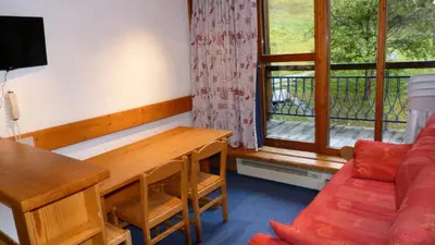 Coin salon dans l'établissement Résidence Aiguille Grive Bat Ii - Appartement 2 pièces en duplex pour 5 personnes proche des pistes dans le village de Charmettoger à Arc 1800 MAE-2079