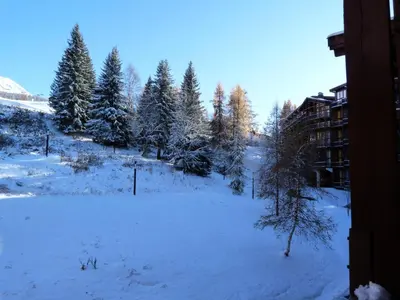 L'établissement Résidence Aiguille Grive Bat Ii - Appartement 2 pièces en duplex pour 5 personnes proche des pistes dans le village de Charmettoger à Arc 1800 MAE-2079 en hiver
