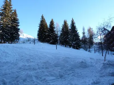 L'établissement Résidence Aiguille Grive Bat Ii - Appartement 2 pièces en duplex pour 5 personnes proche des pistes dans le village de Charmettoger à Arc 1800 MAE-2089 en hiver