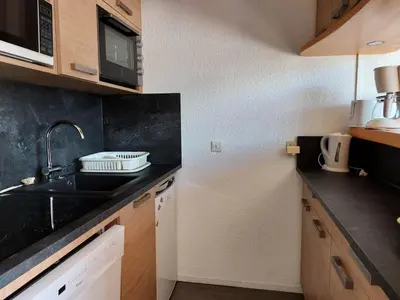 Cuisine ou kitchenette dans l'établissement Résidence Nova - Appartement 3 pièces 7 personnes, proche des pistes, des commerces, de la garderie et de l'ESF au centre de la station d’Arc 180 MAE-2174