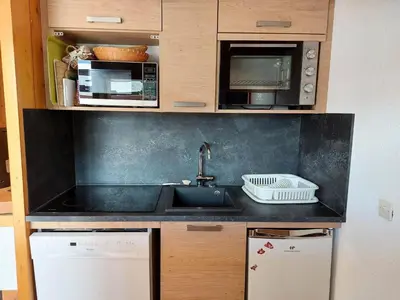 Cuisine ou kitchenette dans l'établissement Résidence Nova - Appartement 3 pièces 7 personnes, proche des pistes, des commerces, de la garderie et de l'ESF au centre de la station d’Arc 180 MAE-2174