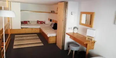 Un ou plusieurs lits dans un hébergement de l'établissement Résidence Aiguille Grive Bat I - Duplex pour 5 personnes à Arc 1800 dans le village de Charmettoger, skis aux pieds MAE-8630