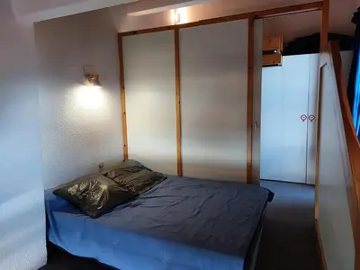Un ou plusieurs lits dans un hébergement de l'établissement Résidence Archeboc - Agréable Duplex 6 personnes, situé au dernier étage, avec très jolie vue sur la vallée, les montagnes et le Mont-Blanc. MAE-6554