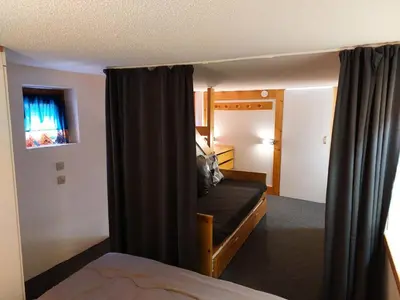 Un ou plusieurs lits dans un hébergement de l'établissement Résidence Archeboc - Appartement en duplex pour 6 personnes à Arc 1800 proche des pistes dans le village de Charmettoger MAE-2694