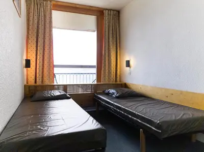 Un ou plusieurs lits dans un hébergement de l'établissement Résidence Nova - Appartement 2 pièces 6 personnes proche des pistes, des commerces, de la garderie et de l'ESF au centre de la station d’Arc 1800 MAE-9214